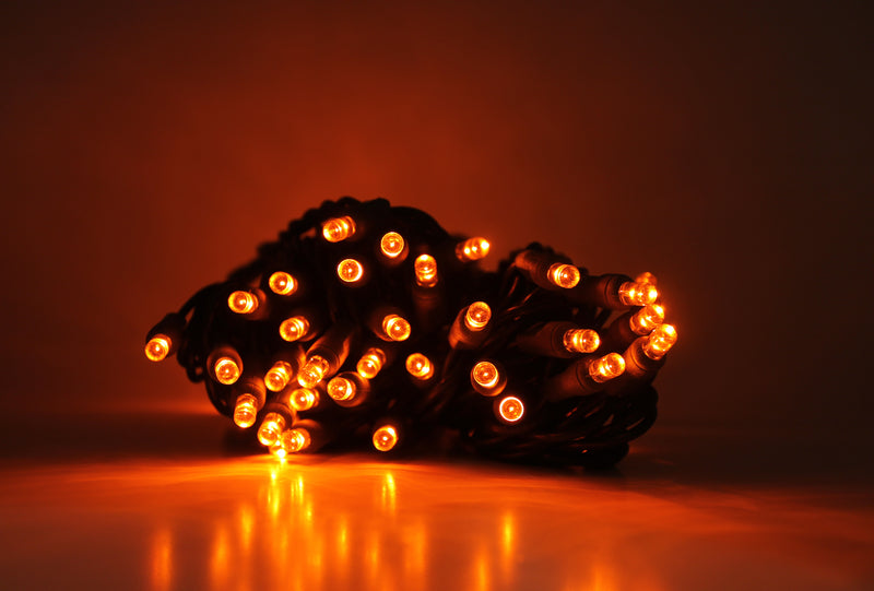 Outdoor LED Lighted Christmas Tree with Green Base and Red and White Tree Lights