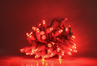 Outdoor LED Lighted Christmas Tree with a White Base and Green Tree Lights